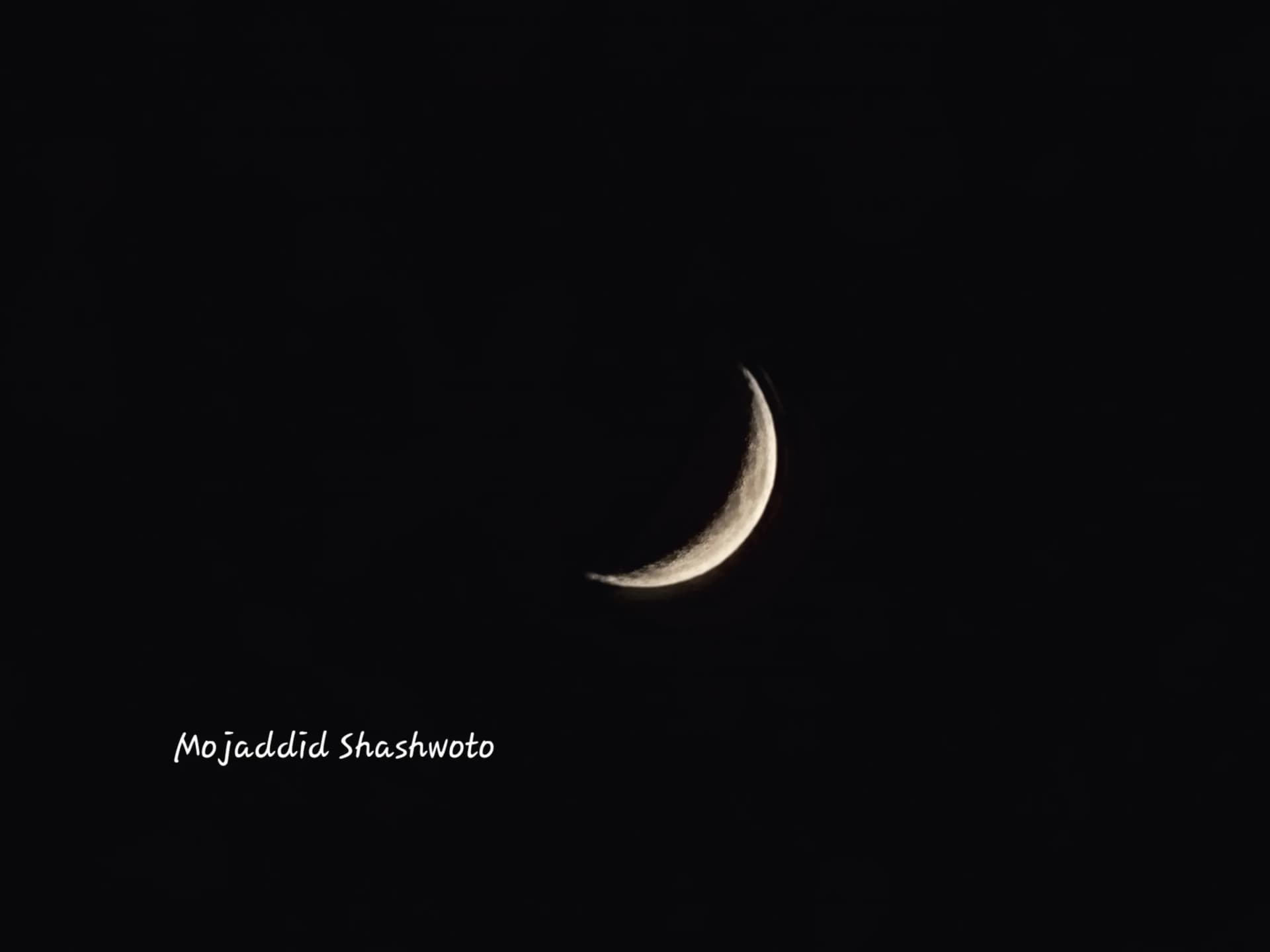 Bright crescent moon isolated in dark night sky